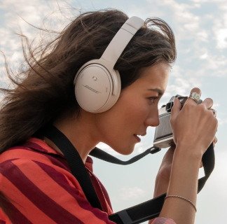 Woman with Bose headphones