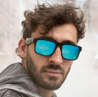 Man wearing Bose audio sunglasses